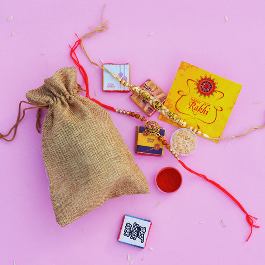 Set of Two Rakhi and Chocolate Potli