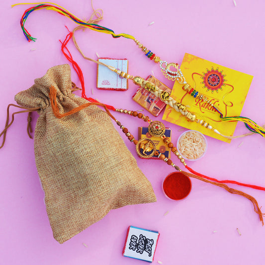 Set of Four Rakhi and Chocolate Potli